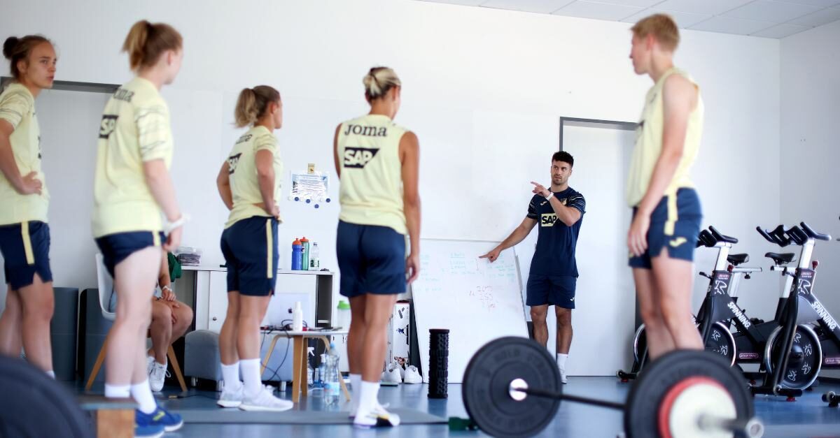 Members of the TSG 1899 Hoffenheim women's soccer team workout in the weight room.