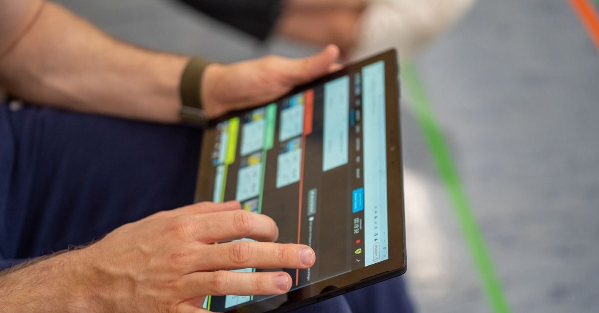 A sports data analyst uses a dashboard to review all of the information collected from the sports performance software his team uses.