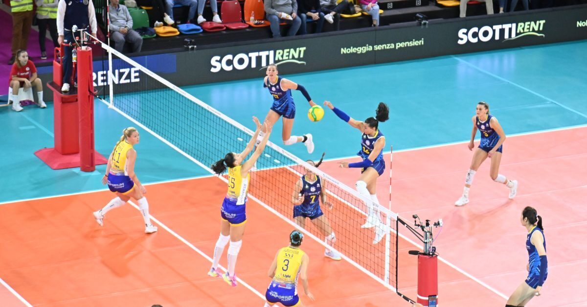 Female athletes during a volleyball match, are now using player tracking devices that gather information like jumps load and acclererations.