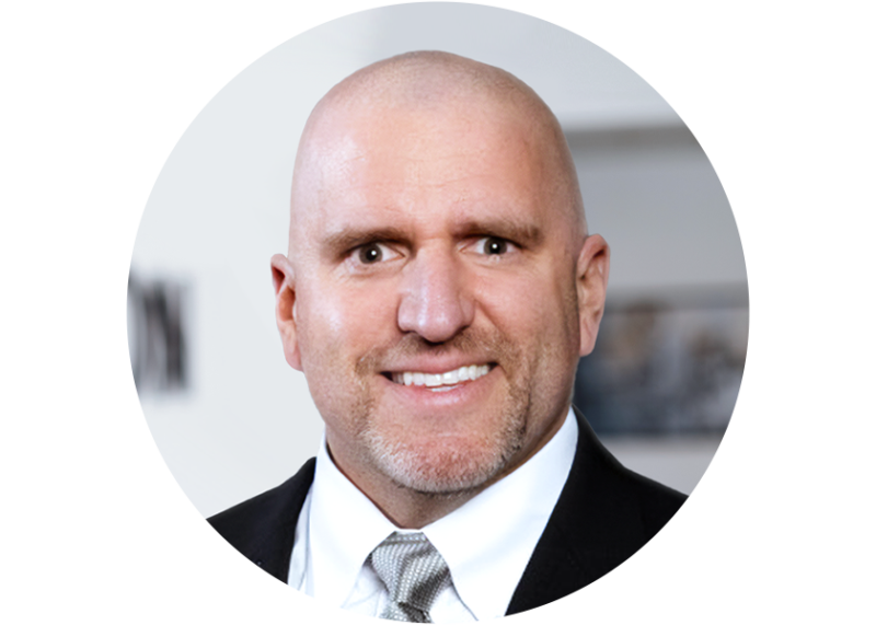 A headshot of the KINEXON Sports Sales Director Jeff Dillman who is an expert on tracking sports data in American football.